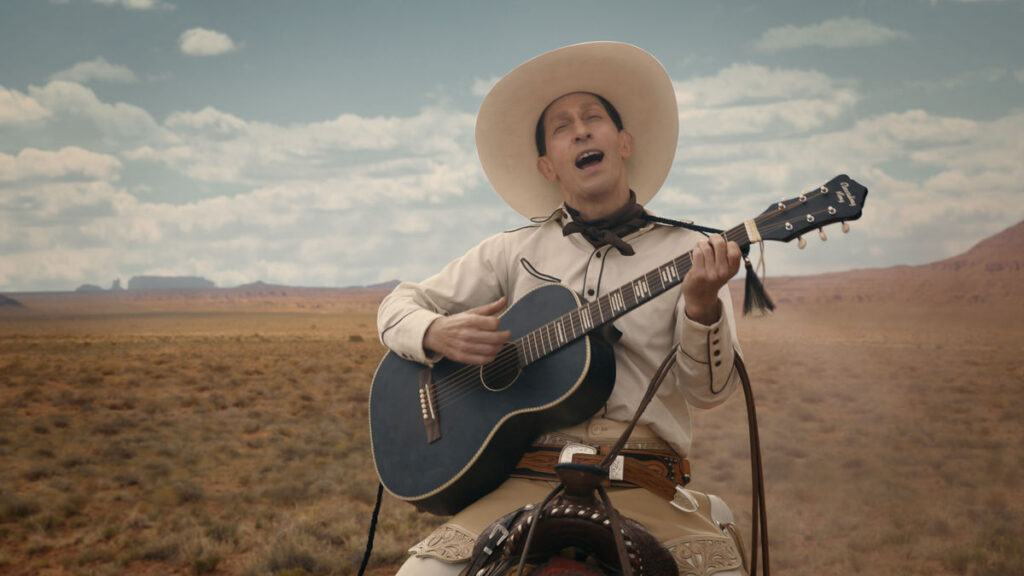 The Ballad of Buster Scruggs filminde Tim Blake Nelson'ın Buster Scruggs karakteri
